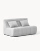 Sofa dwuosobowa SHAPE - sofa dwuosobowa z widokiem z boku, z poduszkami na siedzisku i wyraźnymi przeszyciami.
