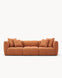 Sofa modułowa AURA (3 el.) - widok z przodu na modułową sofę z poduszkami, o zaokrąglonych kształtach.