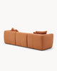 Sofa modułowa AURA (3 el.) - widok z boku na modułową sofę z poduszkami, z wyraźnymi przeszyciami.