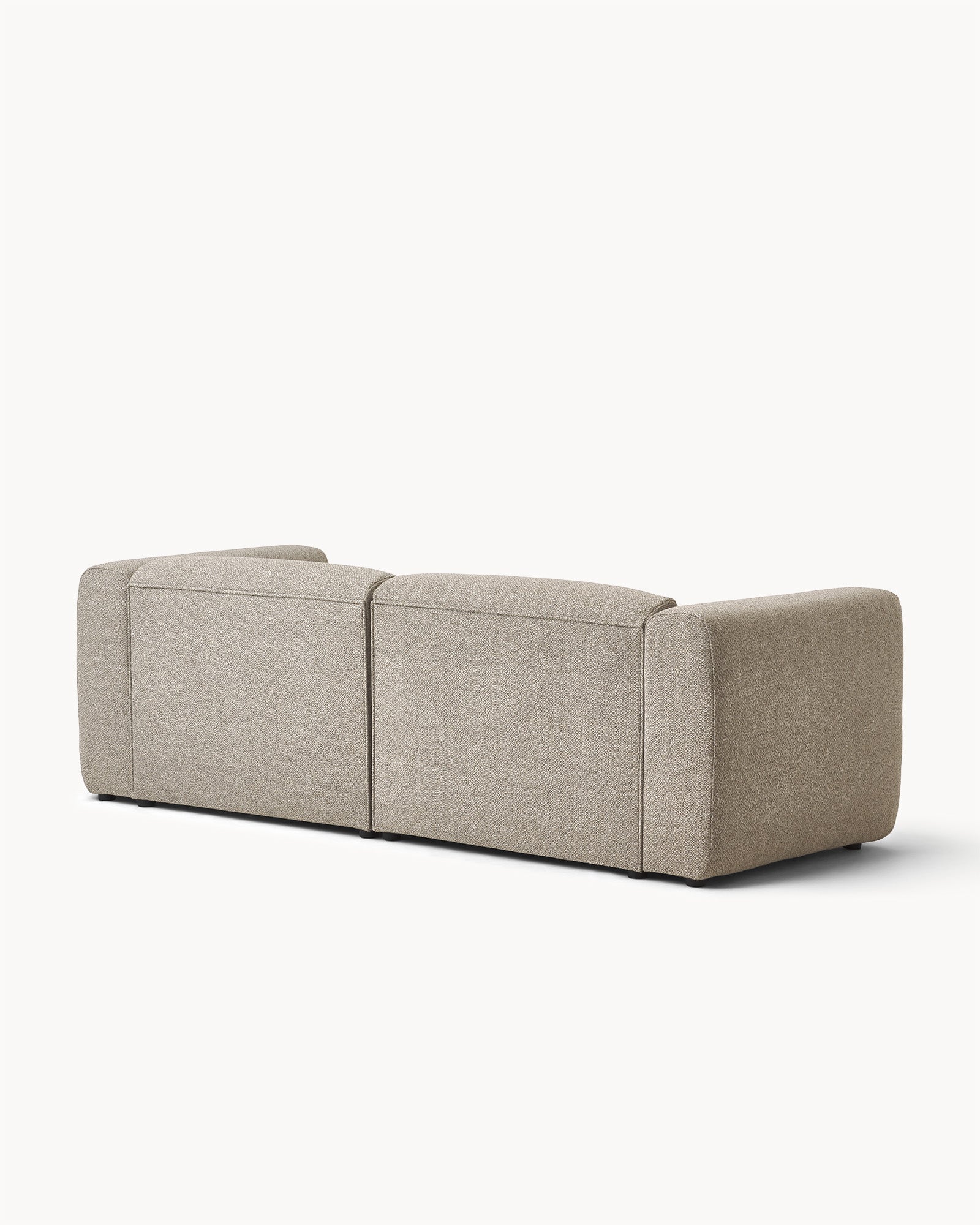 Sofa modułowa MODULO - widok z boku na modułową sofę z zaokrąglonymi bokami i prostą formą.