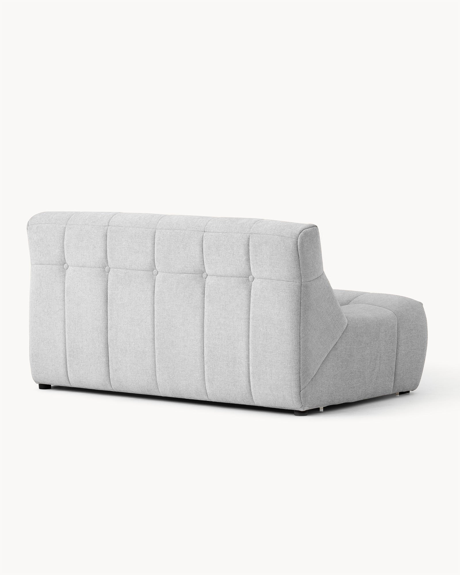 Sofa dwuosobowa SHAPE - widok z boku dwuosobowej sofy z wyraźnym pikowaniem na oparciu.