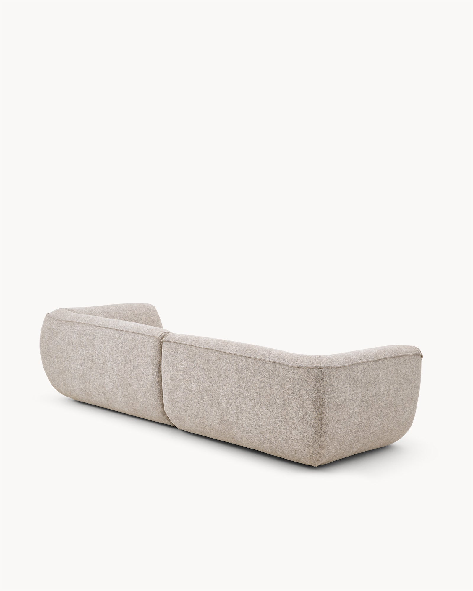 Sofa modułowa VIBE ( 2 el.) - widok z boku na modułową sofę z zaokrąglonymi krawędziami i prostą linią.