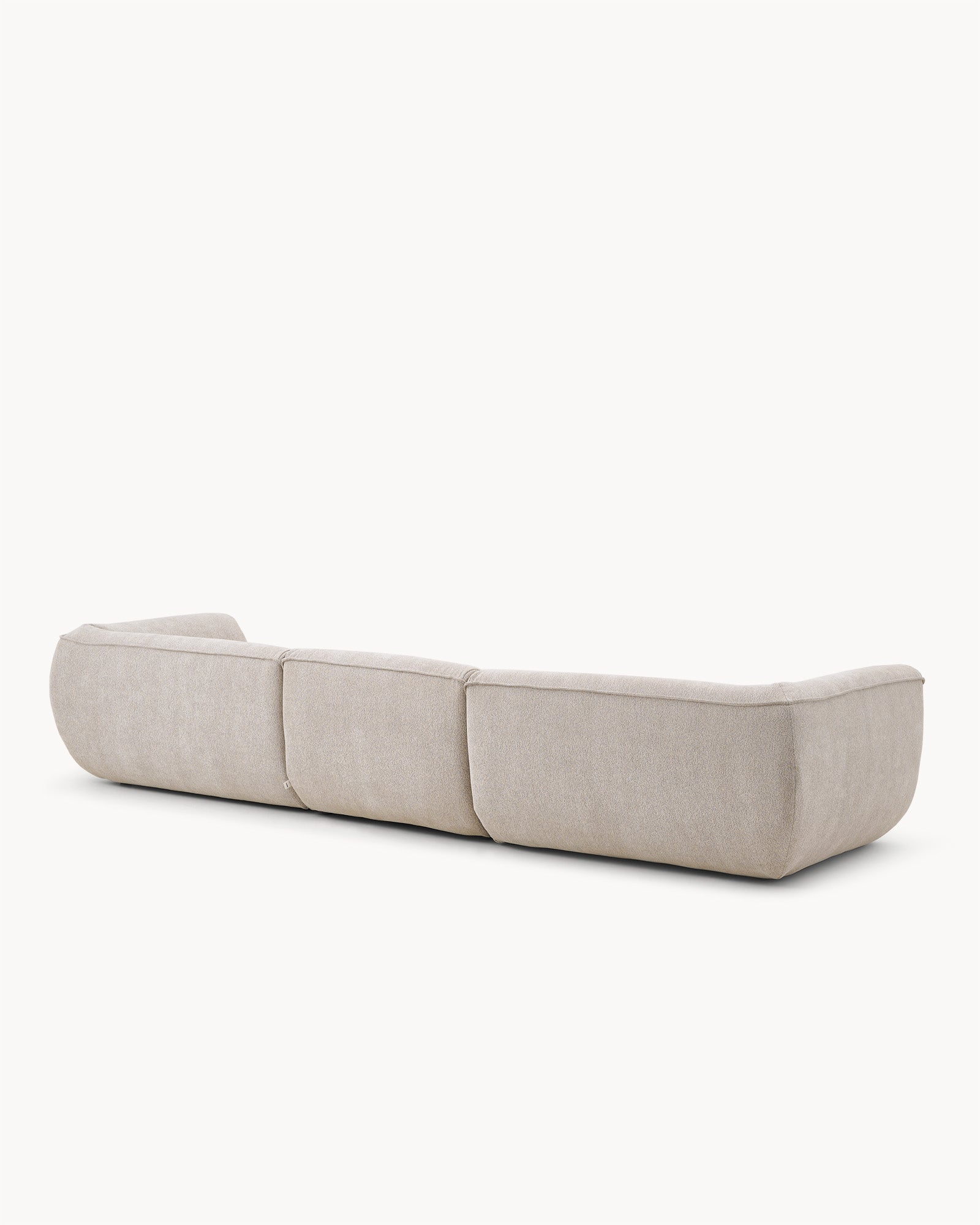 Sofa modułowa VIBE (3 el.) - sofa modułowa widok z boku, z zaokrąglonymi krawędziami i wyraźnymi przeszyciami.